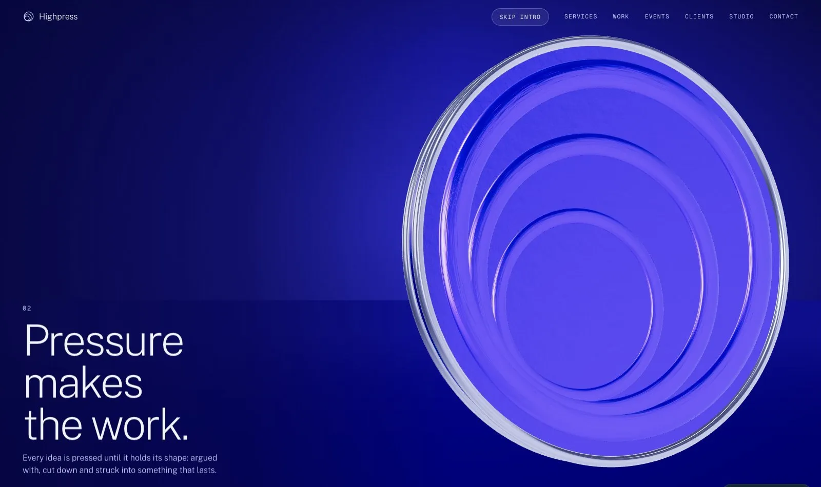 The rings pressed flat into one disc, with the line Pressure makes the work
